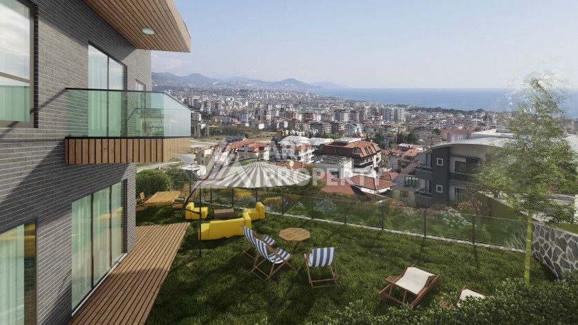 Квартиры от 45 до 193 кв.м. с видом на море и крепость. Буюкхасбахче, Алания - Ракурс 5