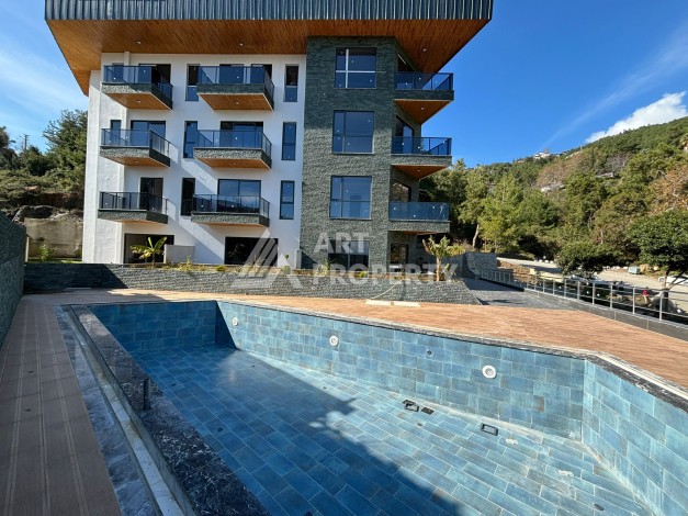 Квартиры от 45 до 193 кв.м. с видом на море и крепость. Буюкхасбахче, Алания - Ракурс 9