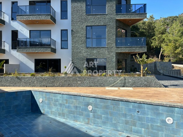 Квартиры от 45 до 193 кв.м. с видом на море и крепость. Буюкхасбахче, Алания - Ракурс 10