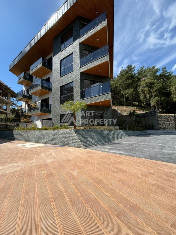 Квартиры от 45 до 193 кв.м. с видом на море и крепость. Буюкхасбахче, Алания - Ракурс 11