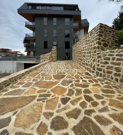 Квартиры от 45 до 193 кв.м. с видом на море и крепость. Буюкхасбахче, Алания - Ракурс 13