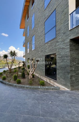 Квартиры от 45 до 193 кв.м. с видом на море и крепость. Буюкхасбахче, Алания - Ракурс 14