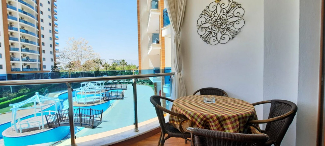 Двухкомнатная квартира в комплексе уровня люкс в районе Махмутлар, 73 м2 - Ракурс 19