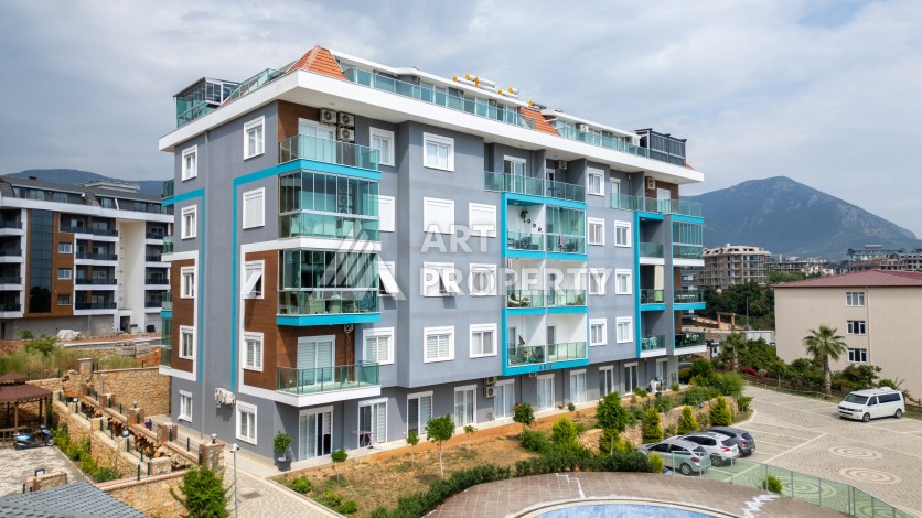 Квартира 1+1 в новом ЖК, 60 кв.м. Оба, Алания. - Ракурс 2