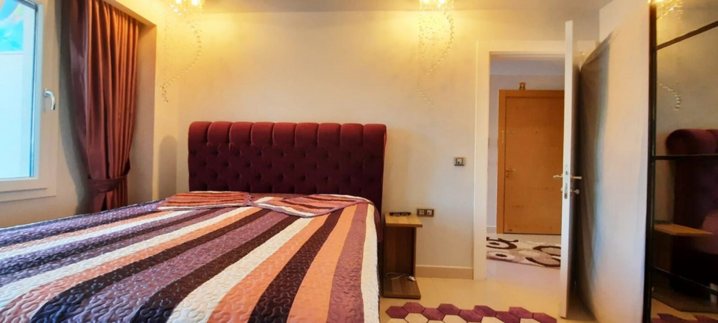 Двухкомнатная квартира в комплексе уровня люкс в районе Махмутлар, 73 м2 - Ракурс 20