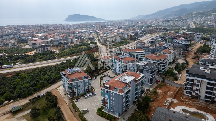 Квартира 1+1 в новом ЖК, 60 кв.м. Оба, Алания. - Ракурс 8