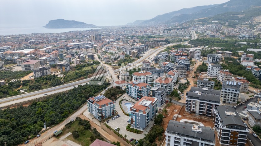 Квартира 1+1 в новом ЖК, 60 кв.м. Оба, Алания. - Ракурс 10