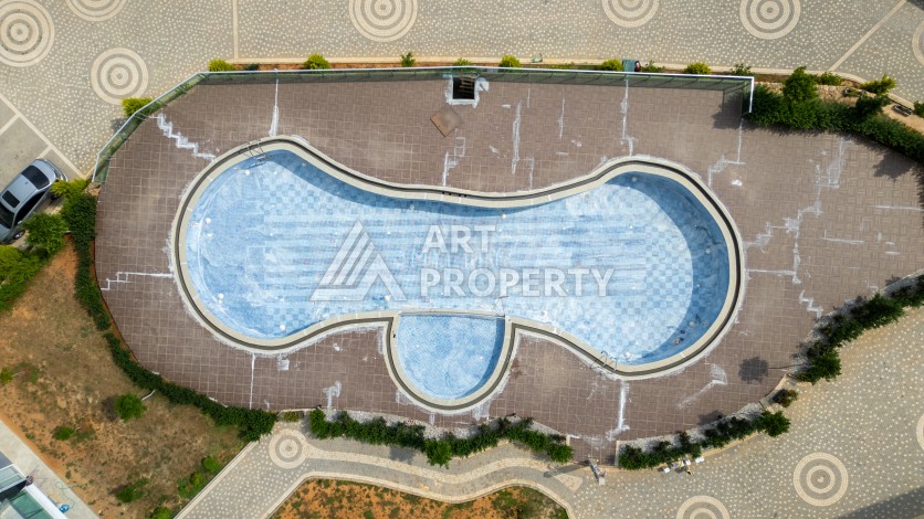 Квартира 1+1 в новом ЖК, 60 кв.м. Оба, Алания. - Ракурс 16