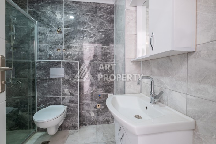 Квартира 1+1 в новом ЖК, 60 кв.м. Оба, Алания. - Ракурс 18