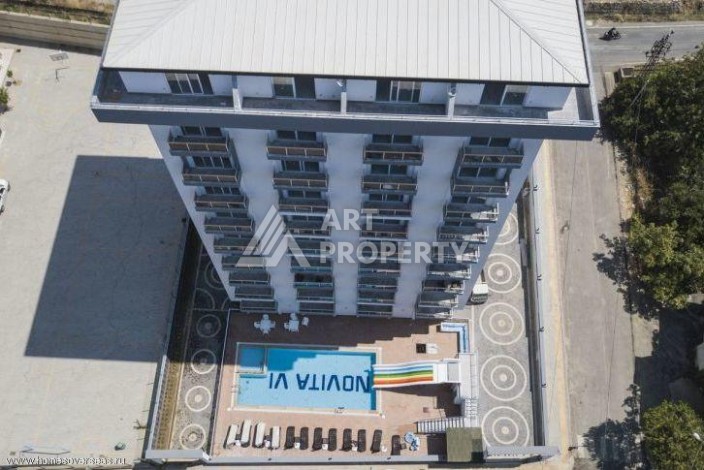 Меблированная квартира 1+1 по выгодной цене в Махмутларе, 55 кв.м. - Ракурс 4