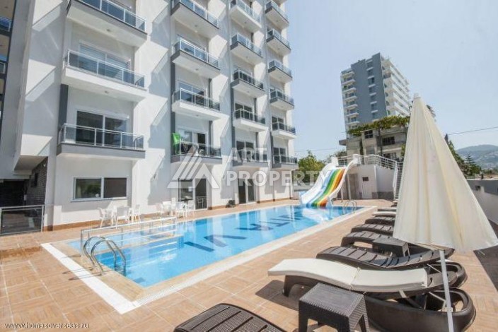 Меблированная квартира 1+1 по выгодной цене в Махмутларе, 55 кв.м. - Ракурс 6