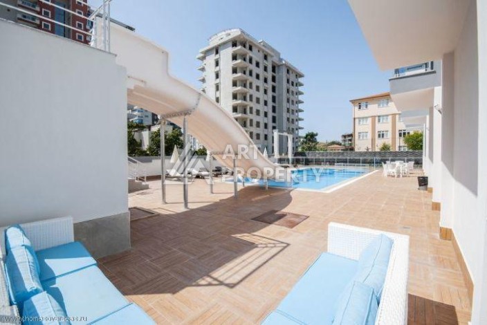 Меблированная квартира 1+1 по выгодной цене в Махмутларе, 55 кв.м. - Ракурс 7