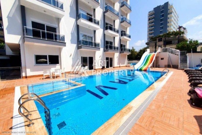 Меблированная квартира 1+1 по выгодной цене в Махмутларе, 55 кв.м. - Ракурс 25