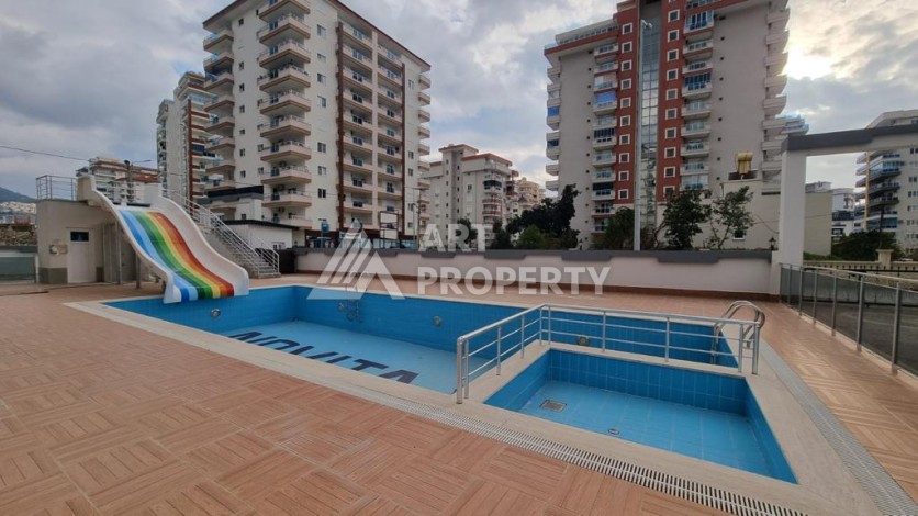 Меблированная квартира 1+1 по выгодной цене в Махмутларе, 55 кв.м. - Ракурс 26