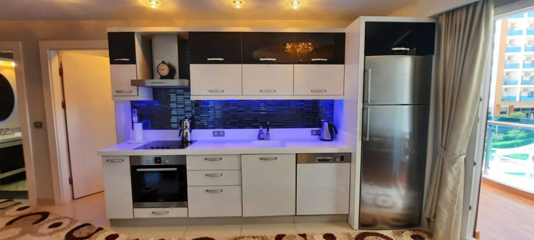 Двухкомнатная квартира в комплексе уровня люкс в районе Махмутлар, 73 м2 - Ракурс 27