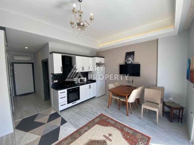 Меблированная квартира 1+1 по выгодной цене в Махмутларе, 55 кв.м. - Ракурс 29