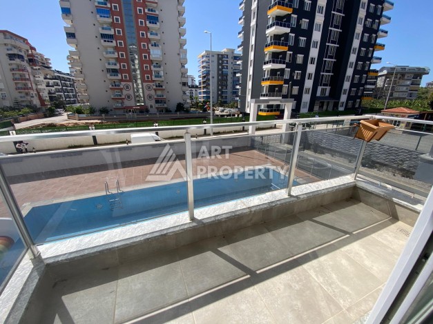 Меблированная квартира 1+1 по выгодной цене в Махмутларе, 55 кв.м. - Ракурс 30