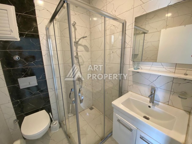 Меблированная квартира 1+1 по выгодной цене в Махмутларе, 55 кв.м. - Ракурс 32