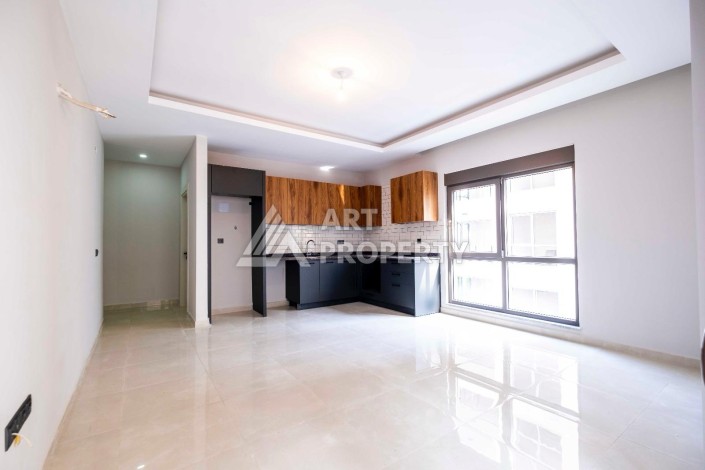 Квартира 1+1 в центре Махмутлара, 55 кв.м. - Ракурс 6