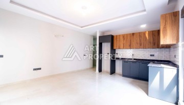 Квартира 1+1 в центре Махмутлара, 55 кв.м. - Ракурс 8