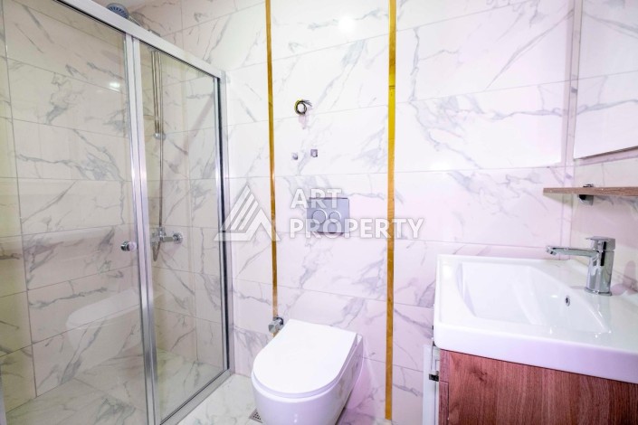 Квартира 1+1 в центре Махмутлара, 55 кв.м. - Ракурс 8