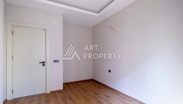 Квартира 1+1 в центре Махмутлара, 55 кв.м. - Ракурс 11