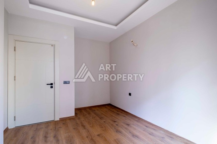 Квартира 1+1 в центре Махмутлара, 55 кв.м. - Ракурс 10