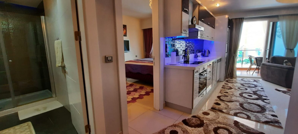 Двухкомнатная квартира в комплексе уровня люкс в районе Махмутлар, 73 м2 - Ракурс 32