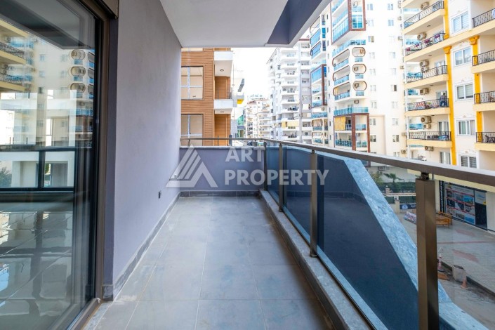 Квартира 1+1 в центре Махмутлара, 55 кв.м. - Ракурс 12