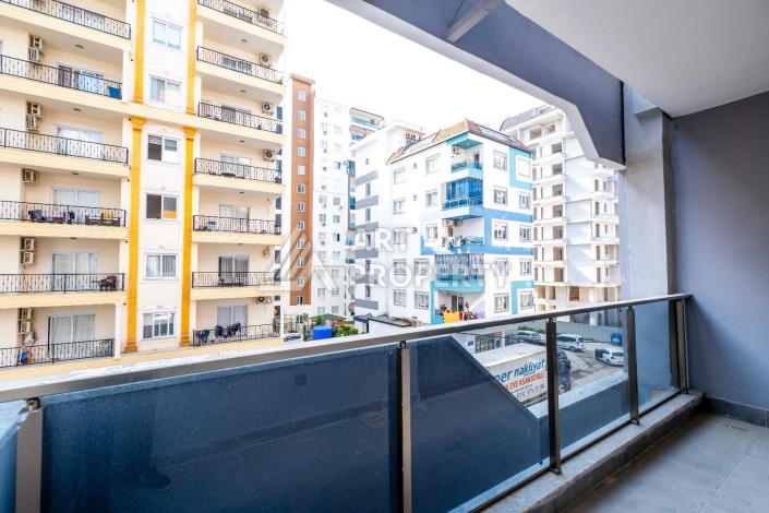 Квартира 1+1 в центре Махмутлара, 55 кв.м. - Ракурс 13