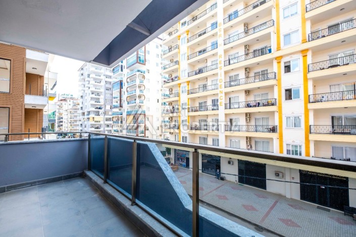 Квартира 1+1 в центре Махмутлара, 55 кв.м. - Ракурс 14