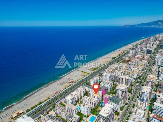 Квартира 2+1 на первой береговой линии, 95 кв.м. Махмутлар, Алания. - Ракурс 2