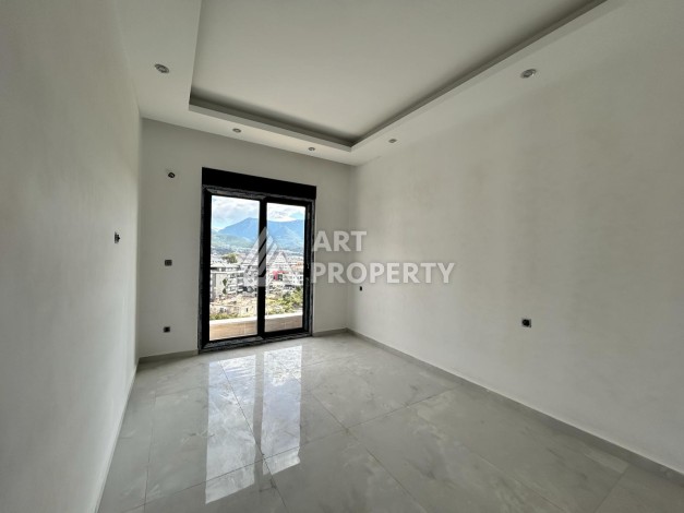 Квартира 1+1 с видом на горы, 55 кв.м. Чиплаклы, Алания. - Ракурс 4