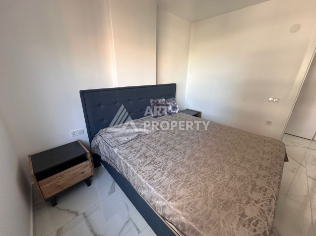 Квартира 1+1 в новой резиденции, 60 кв.м. Махмутлар, Алания - Ракурс 4