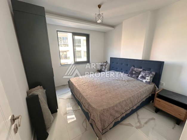 Квартира 1+1 в новой резиденции, 60 кв.м. Махмутлар, Алания - Ракурс 6