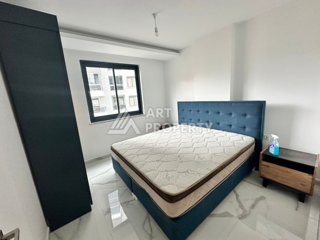 Квартира 1+1 в новой резиденции, 60 кв.м. Махмутлар, Алания - Ракурс 16