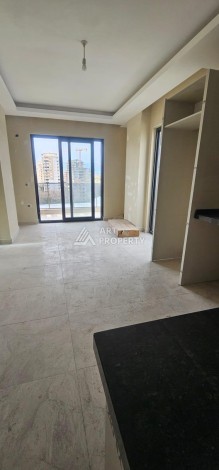 Квартира 1+1 в новой элитной резиденции, 62 кв.м. Махмутлар, Алания. - Ракурс 4