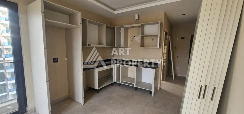 Квартира 1+1 в новой элитной резиденции, 62 кв.м. Махмутлар, Алания. - Ракурс 6