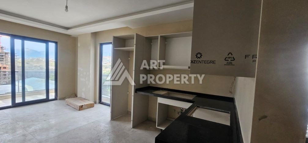 Квартира 1+1 в новой элитной резиденции, 62 кв.м. Махмутлар, Алания. - Ракурс 8