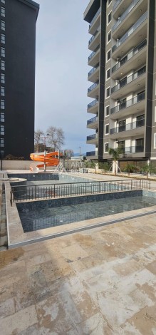 Квартира 1+1 в новой элитной резиденции, 62 кв.м. Махмутлар, Алания. - Ракурс 9