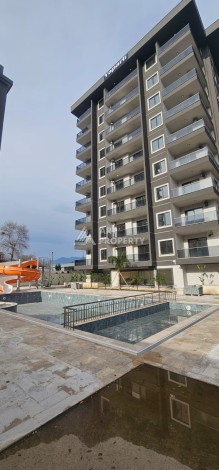 Квартира 1+1 в новой элитной резиденции, 62 кв.м. Махмутлар, Алания. - Ракурс 18