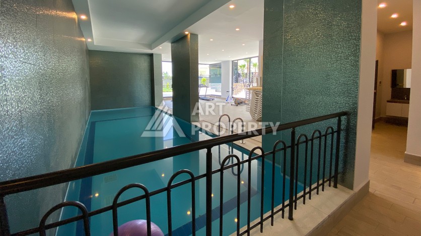 Просторная квартира 3+1 в современном ЖК, 160 кв.м. Махмутлар, Алания. - Ракурс 4