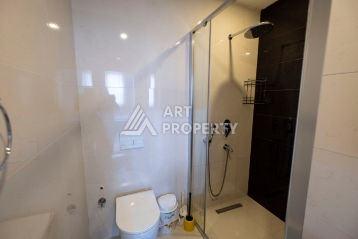 Просторная квартира 3+1 в современном ЖК, 160 кв.м. Махмутлар, Алания. - Ракурс 22