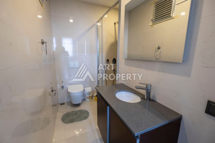 Просторная квартира 3+1 в современном ЖК, 160 кв.м. Махмутлар, Алания. - Ракурс 26