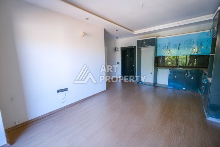 Квартира 1+1 в новом комплексе в Махмутларе, 60 кв.м. - Ракурс 6