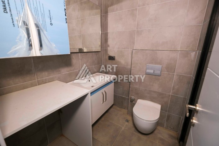 Квартира 1+1 в новом комплексе в Махмутларе, 60 кв.м. - Ракурс 10