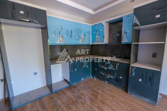 Квартира 1+1 в новом комплексе в Махмутларе, 60 кв.м. - Ракурс 12