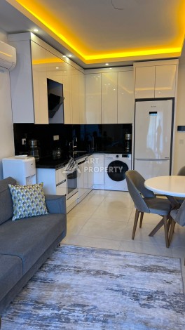 Меблированная квартира 1+1 в престижной резиденции, 55 кв.м. в Махмутларе - Ракурс 3