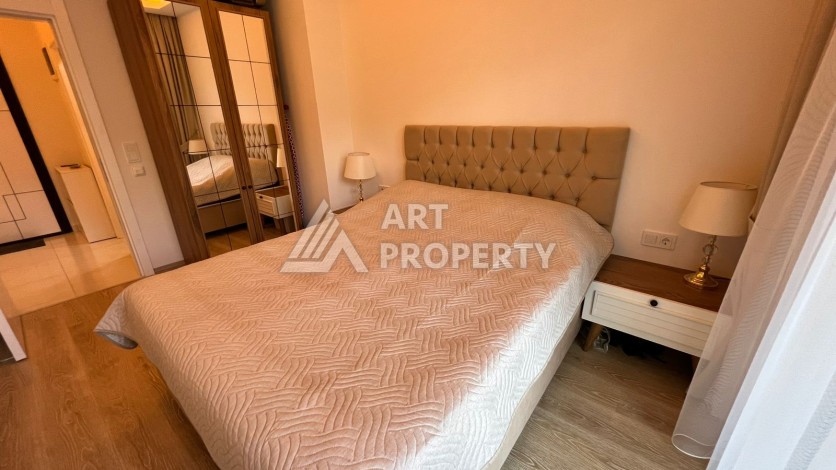 Меблированная квартира 1+1 в престижной резиденции, 55 кв.м. в Махмутларе - Ракурс 8