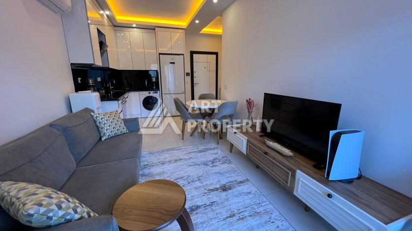 Меблированная квартира 1+1 в престижной резиденции, 55 кв.м. в Махмутларе - Ракурс 9